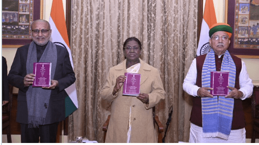 President releasing Constitution of India in Santhali language